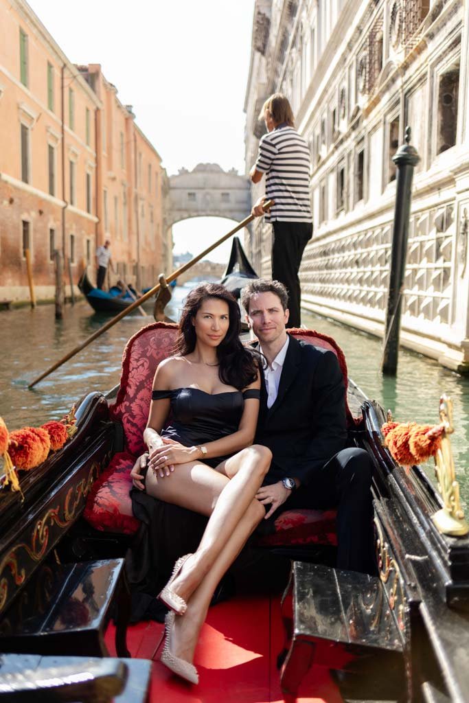 Couple on the gondola in Venice Italy